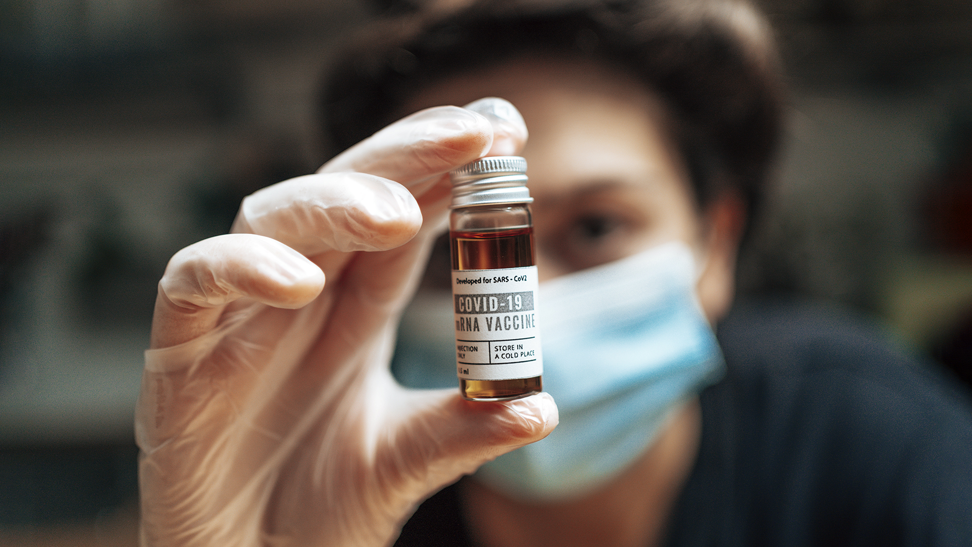 Pharmacist holding the Covid19 vaccine vials